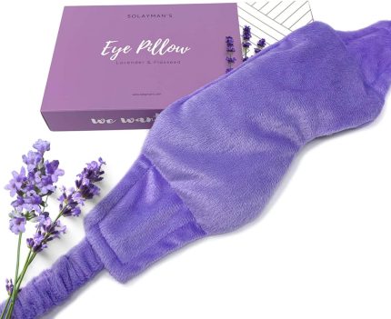 Soft purple eye pillow for relaxation, filled with lavender and flaxseed from Solayman's. Ideal for stress relief and sleep enhancement.